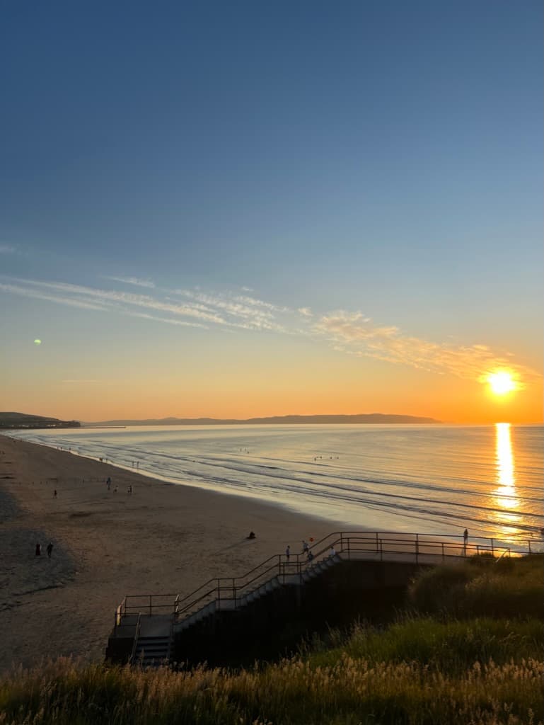 Sunset over beach in Portstewart
