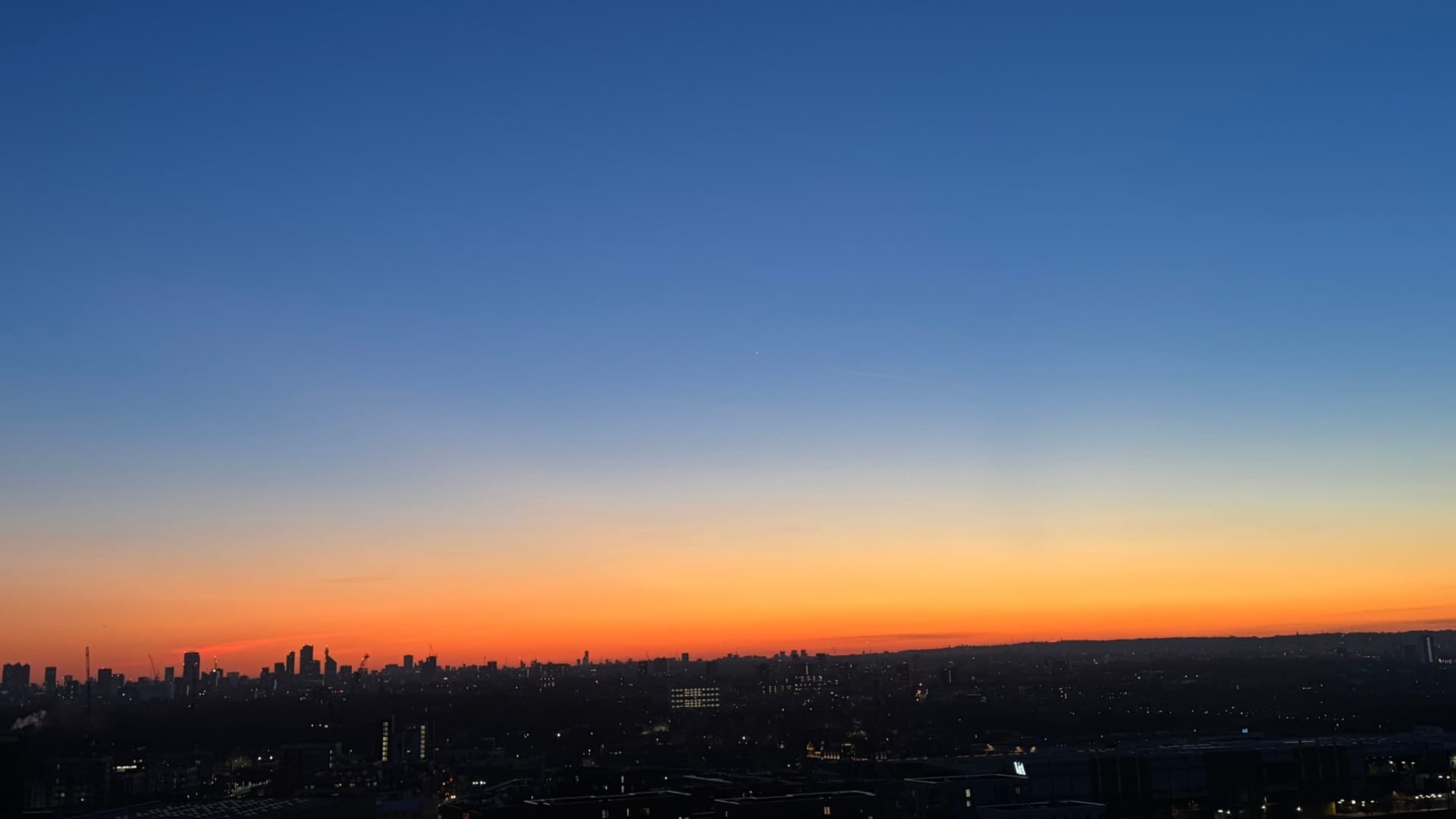 London Sunset with crescent moon 